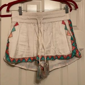 White shorts with pattern on the bottom